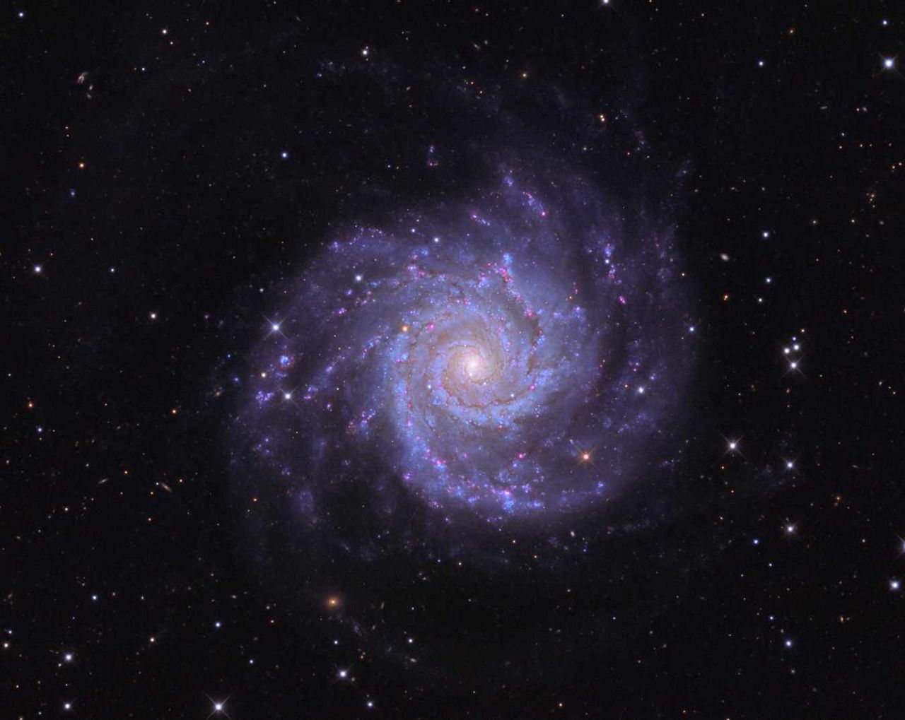 M74 Hidden Disk Reveals a Galaxy Twice as Large